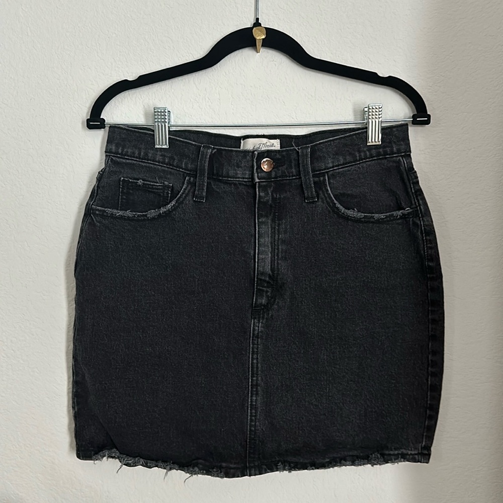 Universal thread black denim skirt, frayed hem.